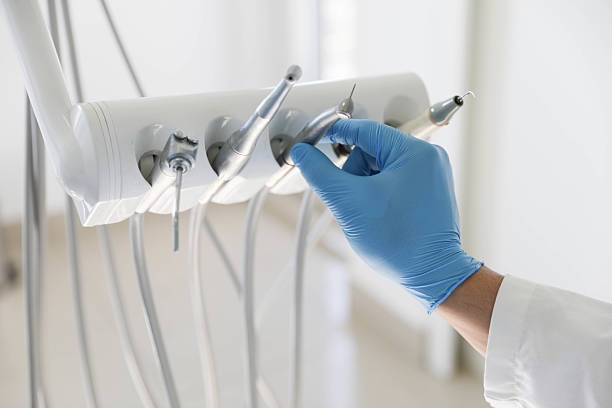 Professional Tooth Extraction technician working in Prestbury, IL